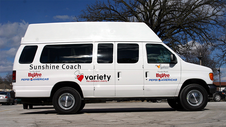 Sunshine Coach, white Variety Van